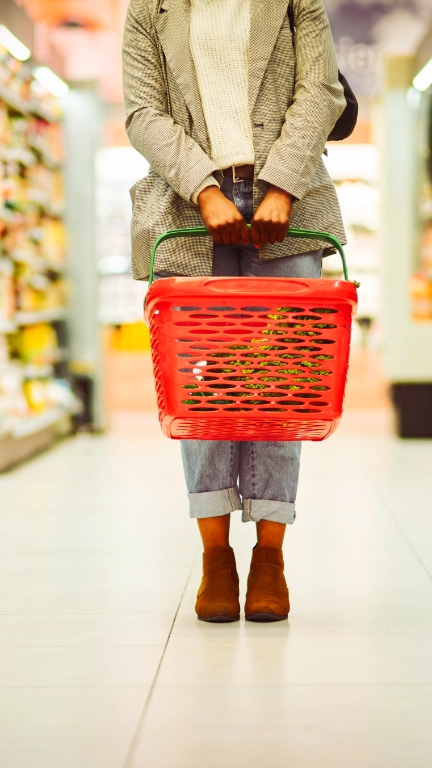 Supermarket shopper with basket