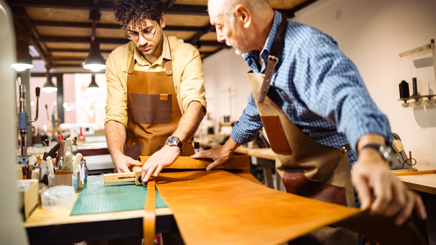 Two tanners working together