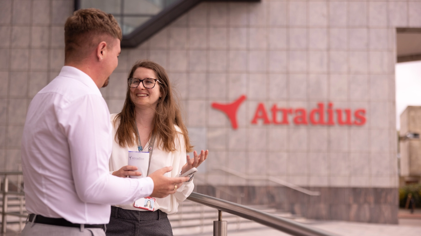 People talking in front of Atradius Cardiff office